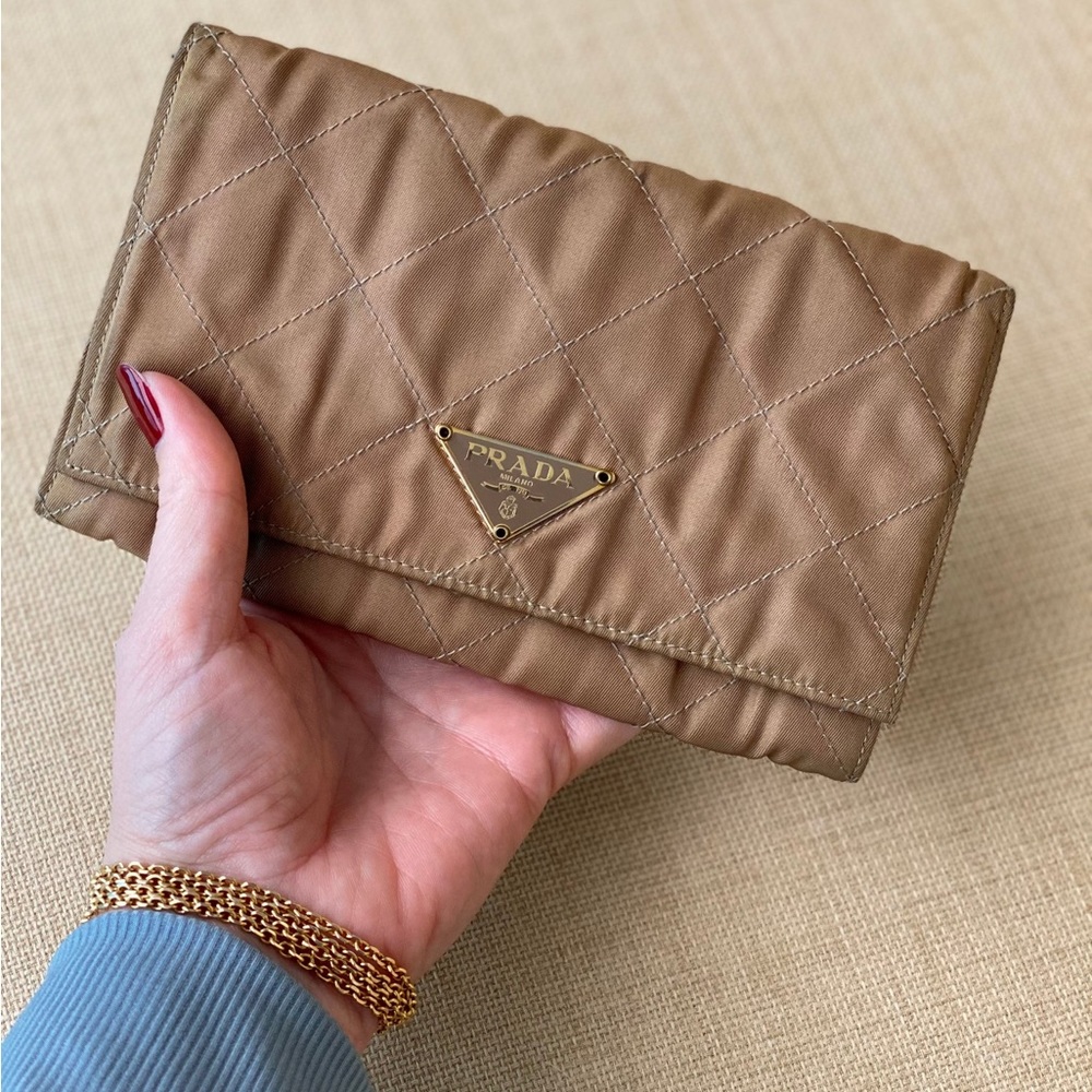 Vintage Prada nylon wallet from the mid 90s is a khaki color.Condition: good.